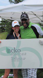 Natalie Cheng-Kai-On and Joe Carter at the Golf Tournament